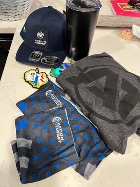 Action Target swag- Hat, Tee, Face Covers , travel mug, morale patch